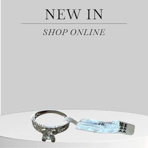 Sleek Silver Ring with Heart Charm